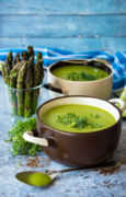 Green asparagus cream soup with herbs